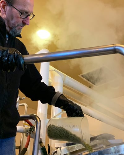 Man pouring grains - Beer and Brewing, Ways to Make it Great! 